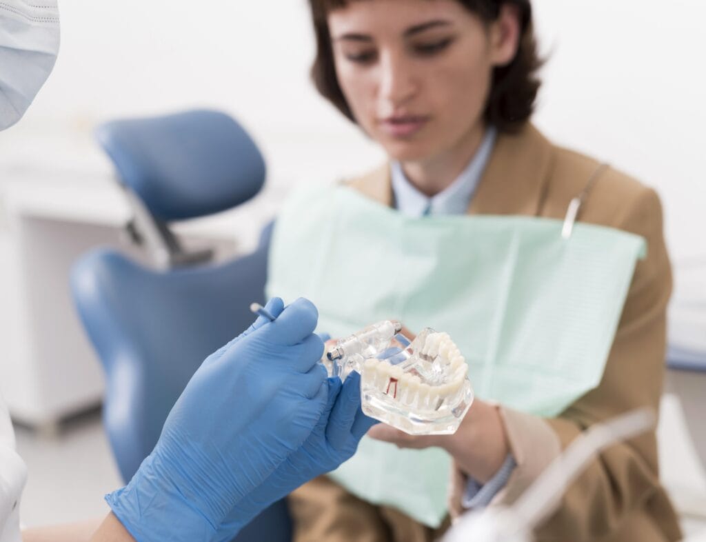 A dentist applying bioactive materials for effective tooth remineralization and restoration.